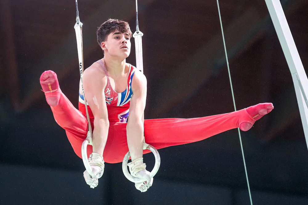 VĐV thể dục dụng cụ dính chấn thương nặng vì tiếp đất bằng đầu ở Commonwealth Games - Ảnh 1. VĐV thể dục dụng cụ dính chấn thương nặng vì tiếp đất bằng đầu ở Commonwealth Games - Ảnh 1.