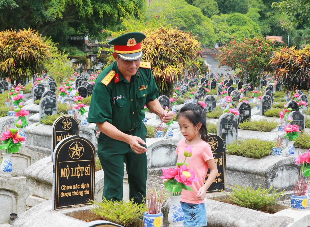 Nghĩa trang liệt sĩ Quốc tế Đồng Tâm - nơi yên nghỉ của những Anh hùng liệt sĩ Việt - Lào - Ảnh 1.