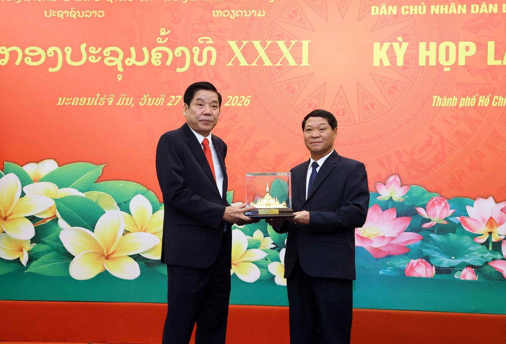 Tiếp tục đẩy mạnh tìm kiếm, quy tập hài cốt liệt sĩ Việt Nam hy sinh tại Lào - Ảnh 7. Tiếp tục đẩy mạnh tìm kiếm, quy tập hài cốt liệt sĩ Việt Nam hy sinh tại Lào - Ảnh 7.