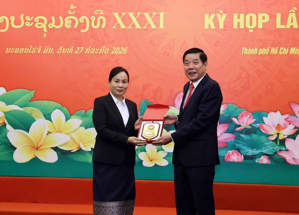 Tiếp tục đẩy mạnh tìm kiếm, quy tập hài cốt liệt sĩ Việt Nam hy sinh tại Lào - Ảnh 8. Tiếp tục đẩy mạnh tìm kiếm, quy tập hài cốt liệt sĩ Việt Nam hy sinh tại Lào - Ảnh 8.