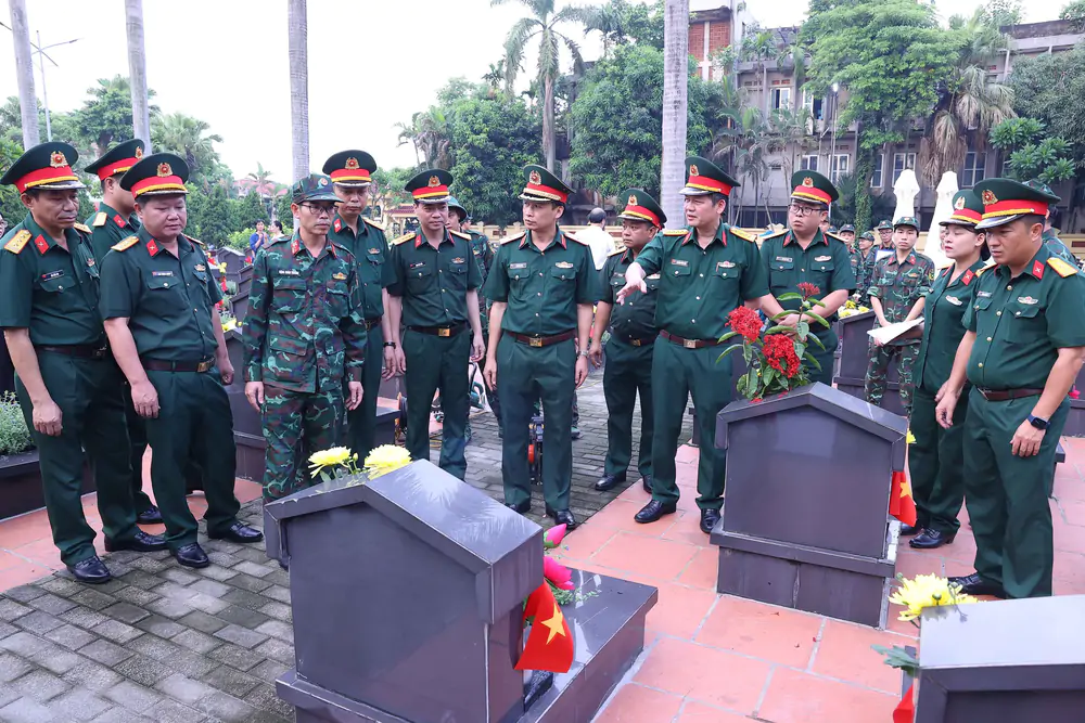 Hà Nội triển khai việc khai quật, lấy mẫu và bàn giao mẫu hài cốt liệt sĩ - Ảnh 6.