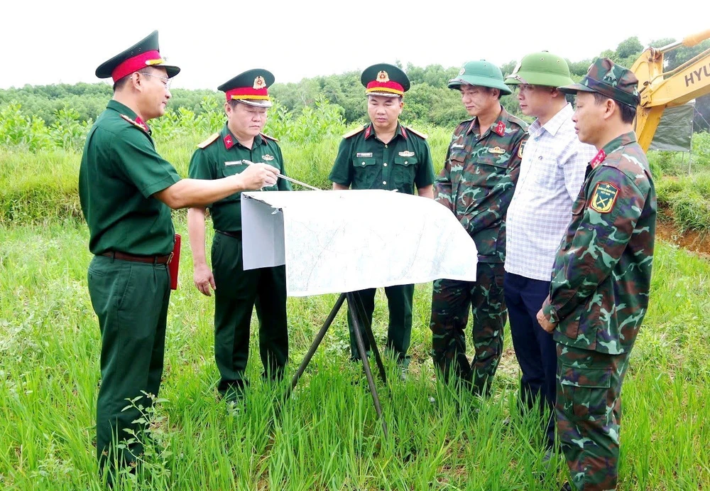 Thủ tướng yêu cầu đẩy mạnh thực hiện tìm kiếm, quy tập và xác định danh tính hài cốt liệt sĩ - Ảnh 2.