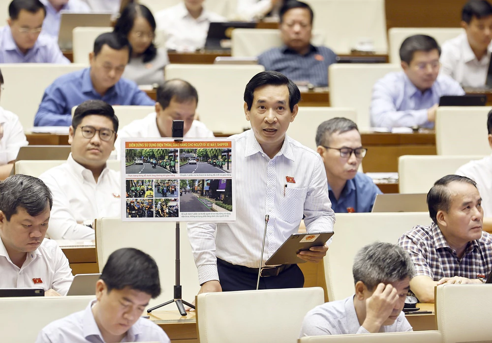 Quốc hội thảo luận về dự án Luật Phát triển đô thị - Ảnh 12. Quốc hội thảo luận về dự án Luật Phát triển đô thị - Ảnh 12.