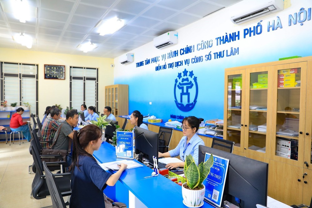 Kiện toàn bộ máy, đẩy mạnh chuyển đổi số: Tạo động lực mới cho chính quyền địa phương 2 cấp - Ảnh 1.