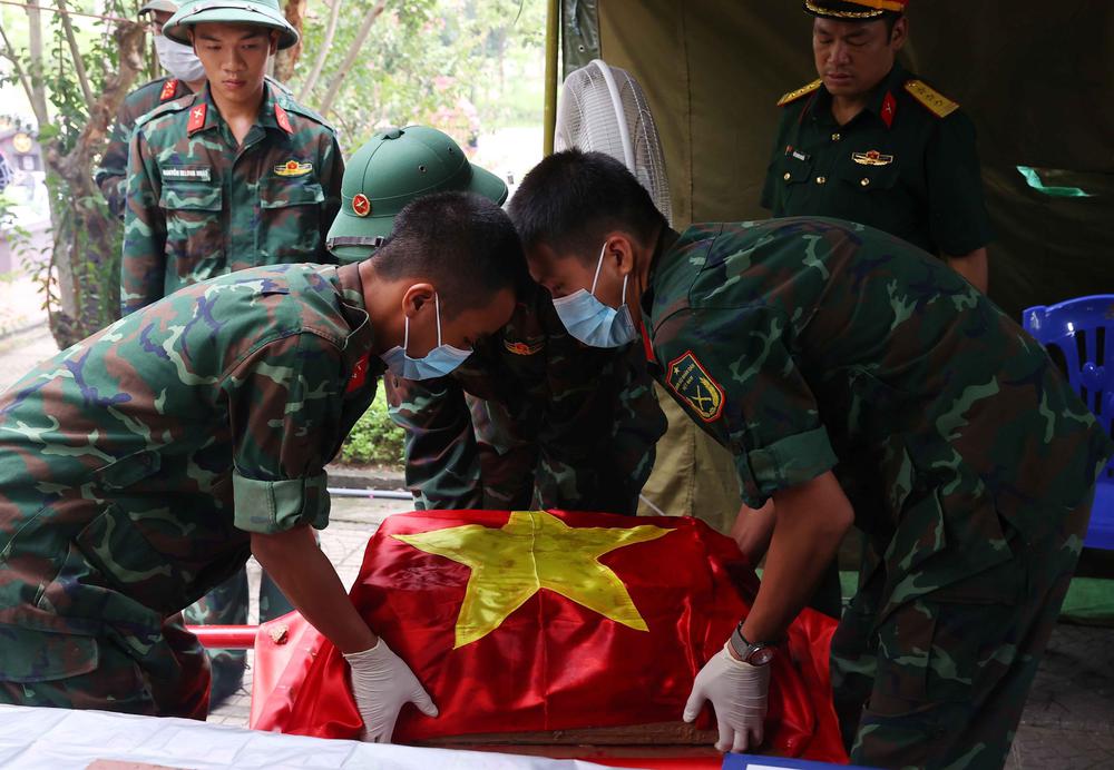 Hà Nội đẩy nhanh tiến độ lấy mẫu hài cốt liệt sĩ - Ảnh 9. Hà Nội đẩy nhanh tiến độ lấy mẫu hài cốt liệt sĩ - Ảnh 9.