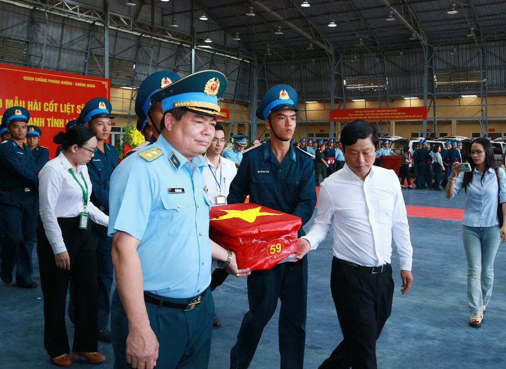 Bàn giao hơn 7.000 mẫu hài cốt liệt sĩ phục vụ giám định ADN - Ảnh 11.