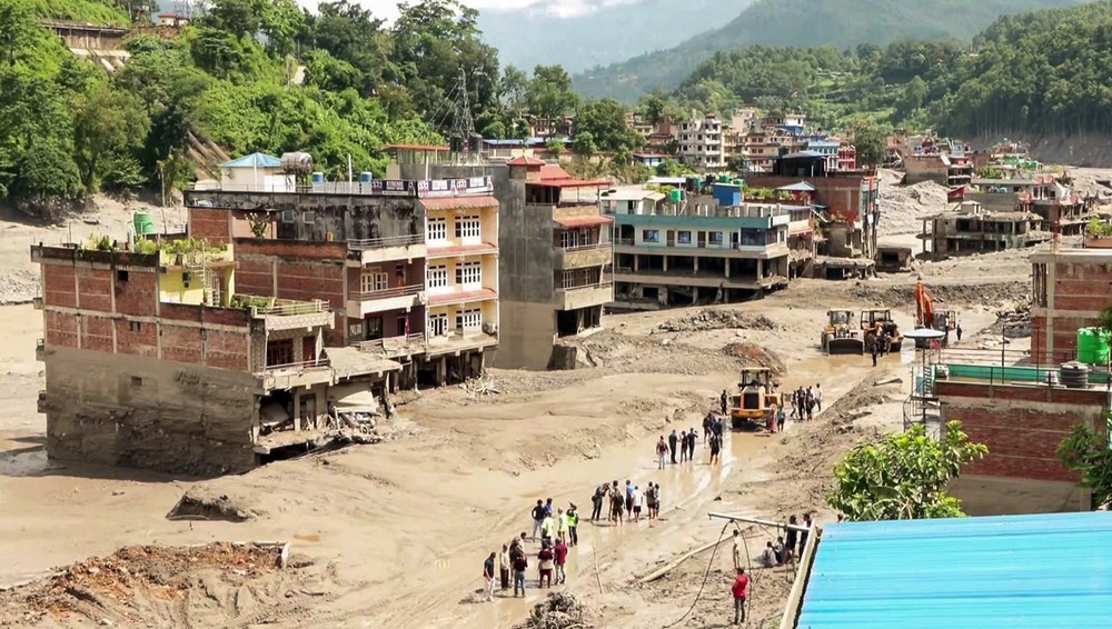 Lũ quét tại Nepal và Trung Quốc: Gần 600 người thiệt mạng và hơn 2.400 người mất tích - Ảnh 2.
