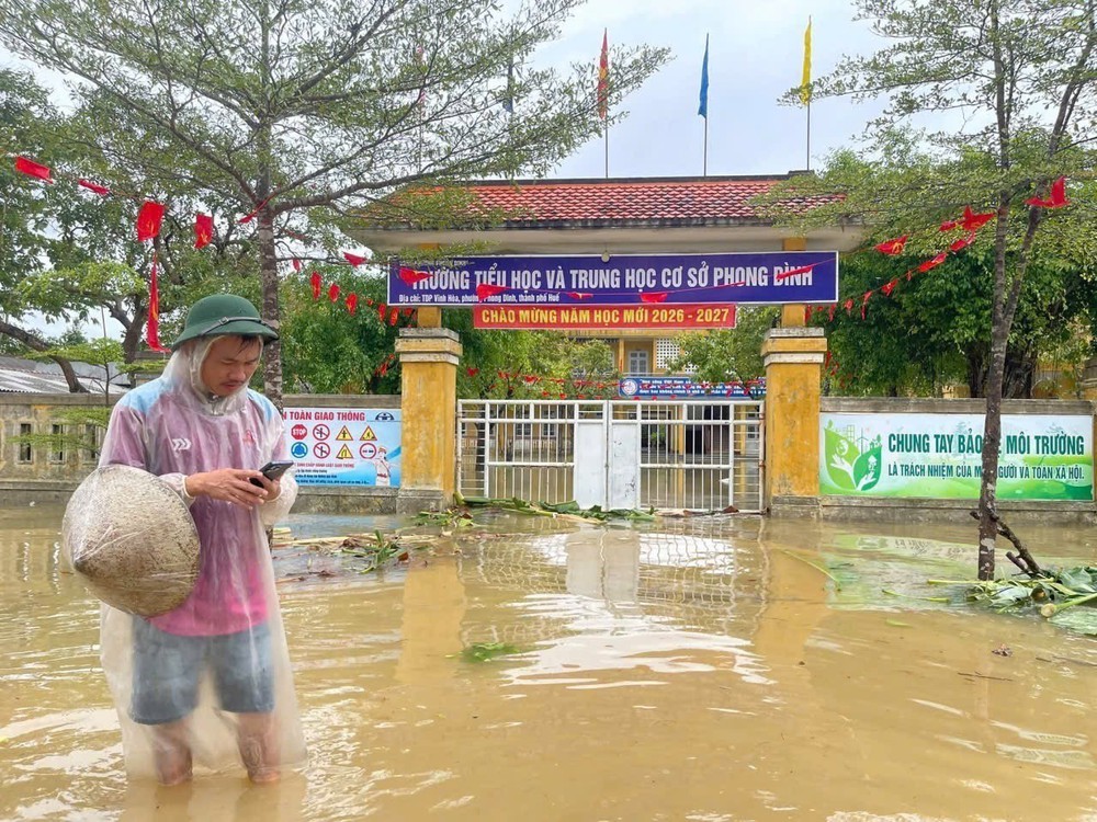 Huế: Mưa lớn khiến một số địa phương bị ngập lụt - Ảnh 5.