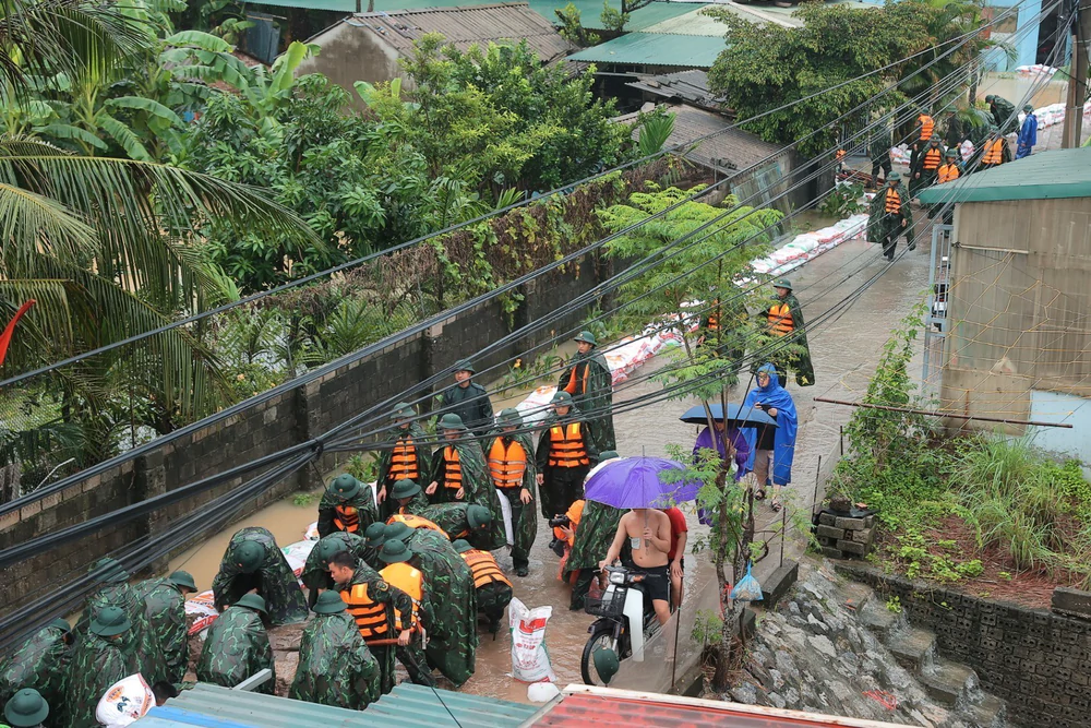 Báo động III trên sông Tích, sông Bùi, thành phố Hà Nội khẩn trương ứng phó với lũ - Ảnh 14. Báo động III trên sông Tích, sông Bùi, thành phố Hà Nội khẩn trương ứng phó với lũ - Ảnh 14.