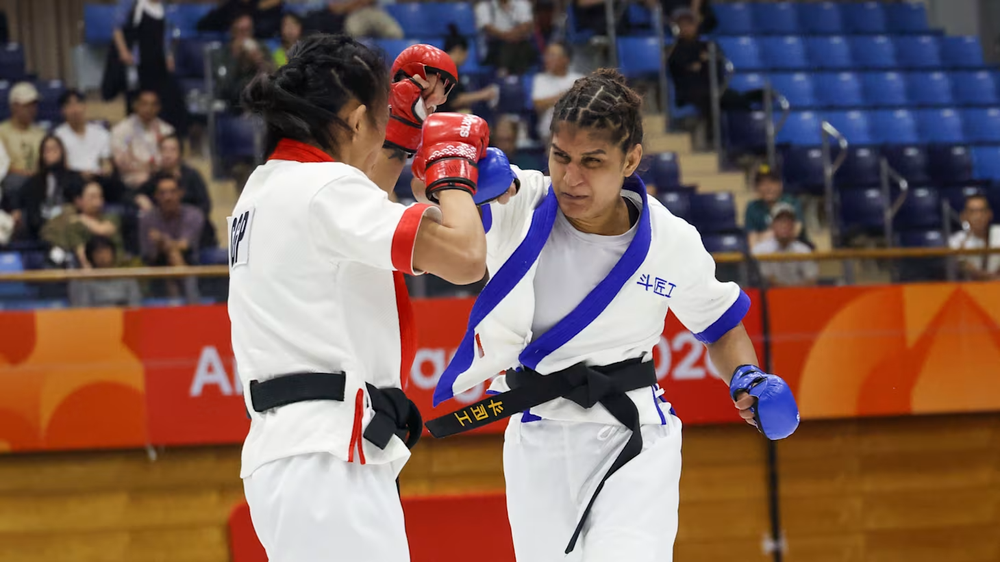 Võ sĩ lỡ trận chung kết ASIAD 2026 chỉ vì nặng hơn đối thủ 700 gram - Ảnh 1. Võ sĩ lỡ trận chung kết ASIAD 2026 chỉ vì nặng hơn đối thủ 700 gram - Ảnh 1.