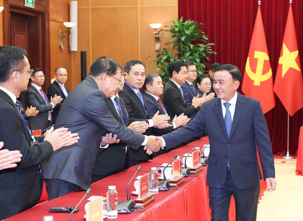 Thường trực Ban Bí thư Trần Cẩm Tú tiếp Đoàn cán bộ cấp cao Đảng Nhân dân Cách mạng Lào - Ảnh 1.