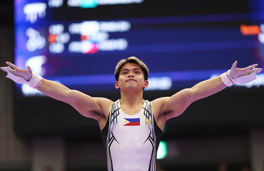 Nhà vô địch Olympic Carlos Yulo lần đầu giành HCV ASIAD, giúp Philippines giải 'cơn khát vàng' - Ảnh 1. Nhà vô địch Olympic Carlos Yulo lần đầu giành HCV ASIAD, giúp Philippines giải 'cơn khát vàng' - Ảnh 1.