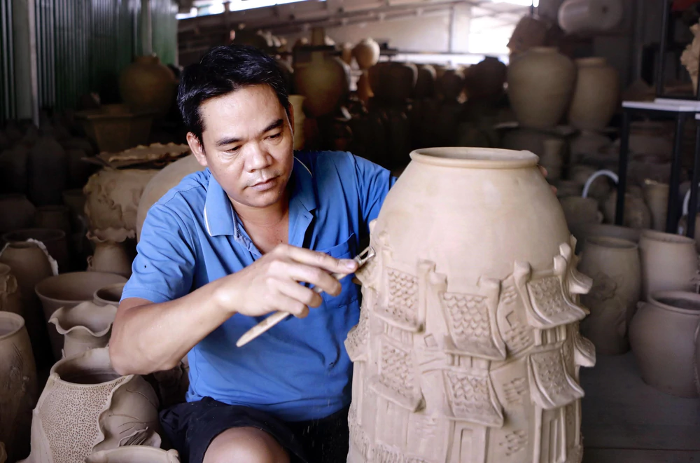 Hồn cốt làng nghề- sức mạnh của công nghiệp văn hóa - Ảnh 1. Hồn cốt làng nghề- sức mạnh của công nghiệp văn hóa - Ảnh 1.