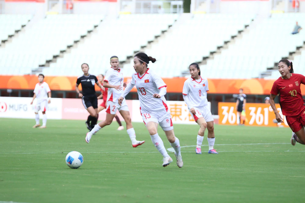 Thua sát nút Trung Quốc sau 120 phút, nữ Việt Nam rời ASIAD 2026 trong thế ngẩng cao đầu - Ảnh 1. Thua sát nút Trung Quốc sau 120 phút, nữ Việt Nam rời ASIAD 2026 trong thế ngẩng cao đầu - Ảnh 1.