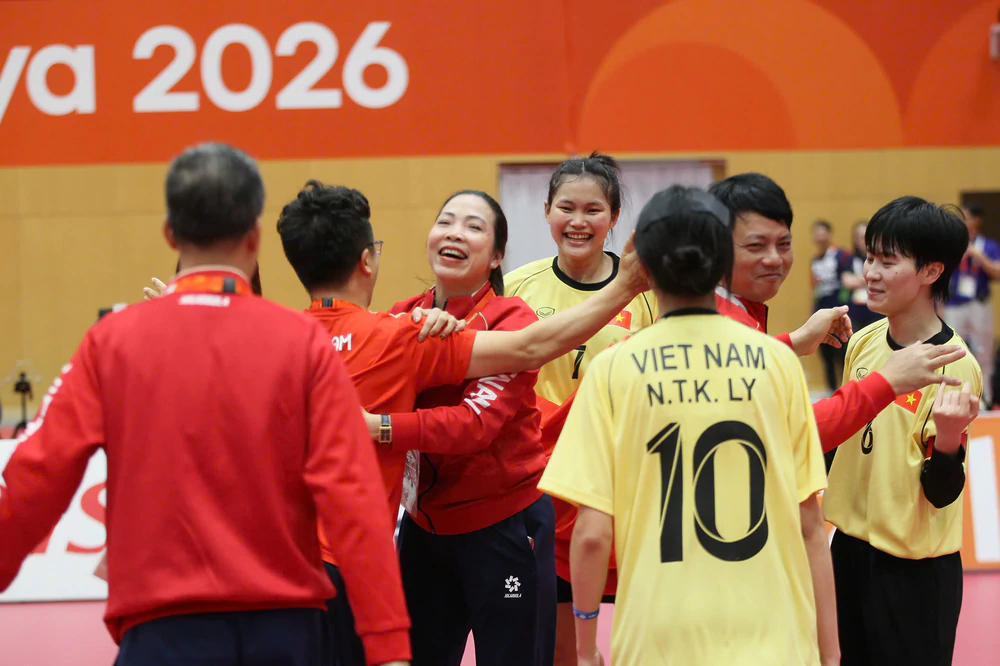 Vỡ òa cảm xúc sau tấm HCV cầu mây đôi nữ ASIAD 2026 - Ảnh 1. Vỡ òa cảm xúc sau tấm HCV cầu mây đôi nữ ASIAD 2026 - Ảnh 1.