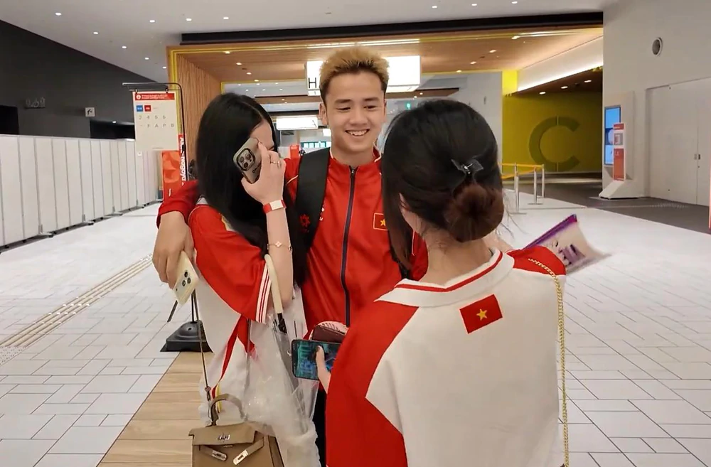 Những CĐV đặc biệt của ĐT PUBG Mobile Việt Nam tại ASIAD 20 - Ảnh 1. Những CĐV đặc biệt của ĐT PUBG Mobile Việt Nam tại ASIAD 20 - Ảnh 1.
