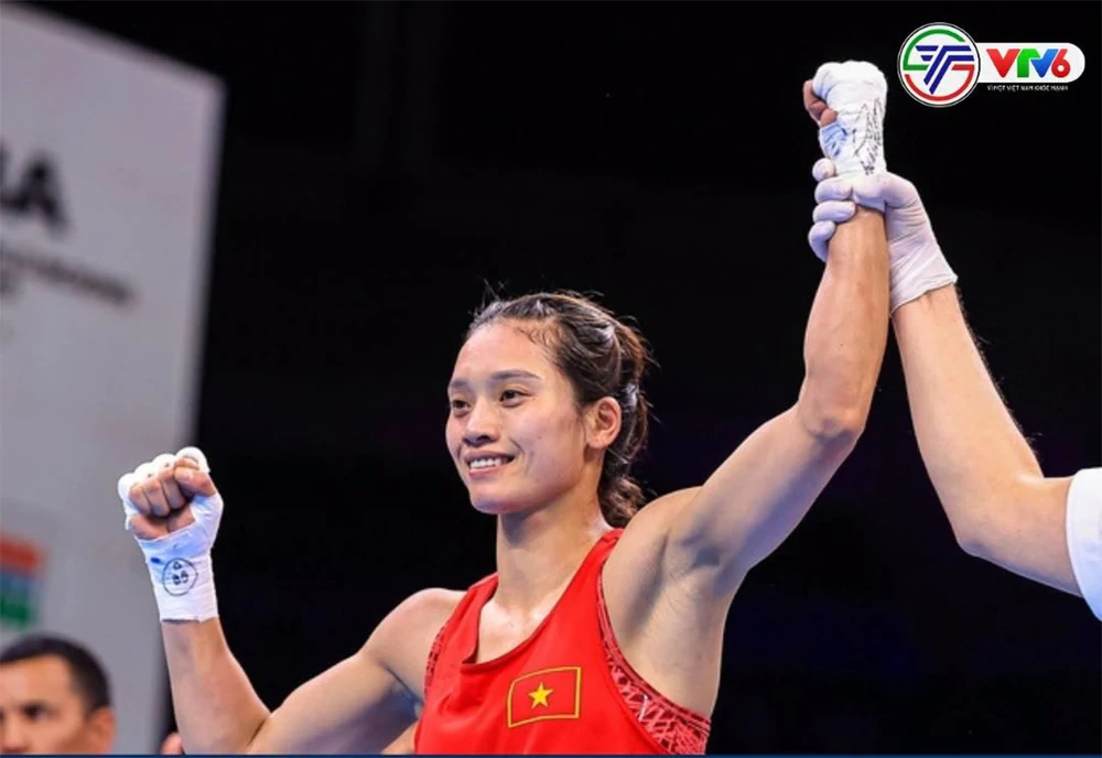 ASIAD 2026: Hạ nhà vô địch thế giới người Kazakhstan, Nguyễn Thị Tâm vào chung kết quyền Anh nữ - Ảnh 2. ASIAD 2026: Hạ nhà vô địch thế giới người Kazakhstan, Nguyễn Thị Tâm vào chung kết quyền Anh nữ - Ảnh 2.