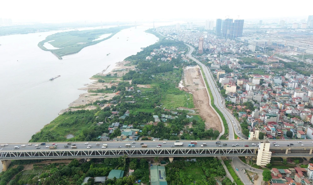 Quy hoạch sông Hồng: Tái định cư phải đi trước thu hồi đất, ưu tiên gần nơi ở cũ - Ảnh 2. Quy hoạch sông Hồng: Tái định cư phải đi trước thu hồi đất, ưu tiên gần nơi ở cũ - Ảnh 2.