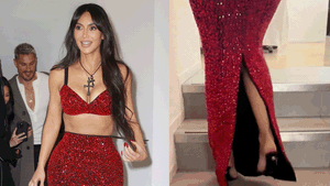 Soi dáng đi &quot;tập tễnh&quot; của Kim Kardashian khi diện đầm Dolce & Gabbana