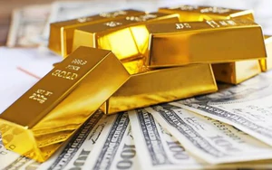 Giá vàng tăng khi đồng USD và lợi suất trái phiếu chính phủ Mỹ đồng loạt giảm
