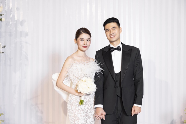 Đám cưới Á hậu Thùy Dung: Cô dâu - chú rể siêu ngọt ngào, dàn khách mời toàn mỹ nhân đình đám Vbiz - Ảnh 2.