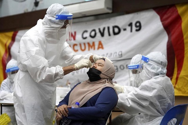 Malaysia và Thái Lan khuyến cáo phòng ngừa Covid-19 lây lan dịp cuối năm - Ảnh 1.