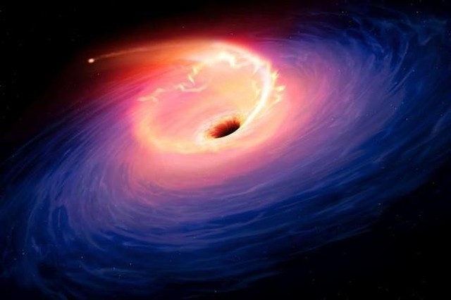 Công nghệ AI tái hiện hình ảnh đầu tiên của một hố đen vũ trụ - Ảnh 1.