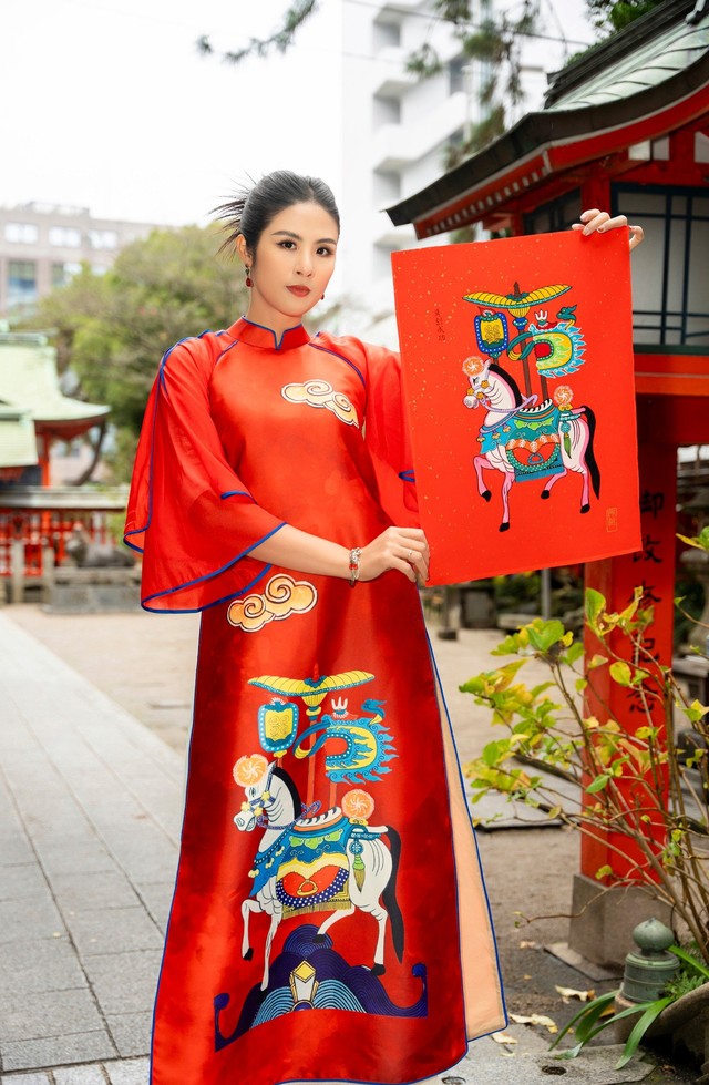 Hoa hậu Ngọc Hân chụp ảnh áo dài dưới thời tiết 2 độ C ở Nhật Bản - Ảnh 1.