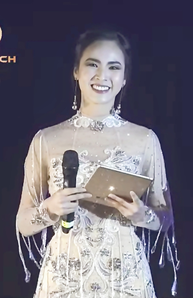 MC Quỳnh Nga gây ấn tượng trên sân khấu Chung kết Hoa hậu Du lịch Quốc tế - Ảnh 2.