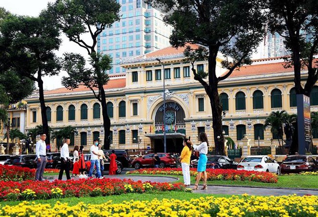 Khách du lịch đến Thành phố Hồ Chí Minh Tết Quý Mão tăng ở hầu hết hành trình tour - Ảnh 1.
