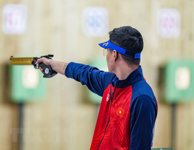 Nhà vô địch ASIAD 19 Phạm Quang Huy giành huy chương đồng bắn súng châu Á - Ảnh 2.