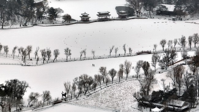 Tuyết rơi hiếm thấy ở miền Nam Trung Quốc - Ảnh 4.