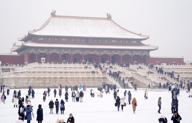 Tuyết rơi hiếm thấy ở miền Nam Trung Quốc - Ảnh 1.