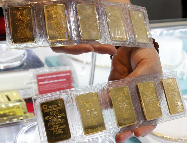  Giá vàng sáng 1/3 tăng 100 nghìn đồng/lượng - Ảnh 1.