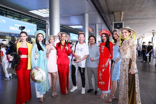 Chủ tịch Nawat và 7 thí sinh Miss Grand 'chốt đơn' nhiều nhất đổ bộ, diện áo dài để ghi điểm fan Việt - Ảnh 13.