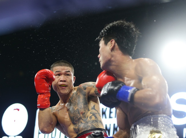 “Nam Vương” Trương Đình Hoàng thành công bảo vệ  đai WBA châu Á - Ảnh 1.