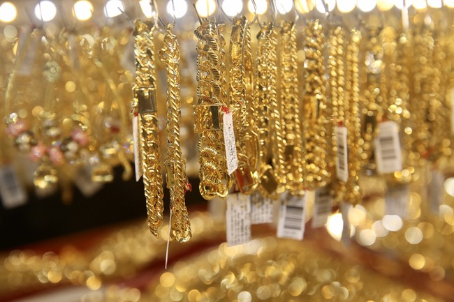 Giá vàng sáng 31/3 tăng 100 nghìn đồng/lượng - Ảnh 1.