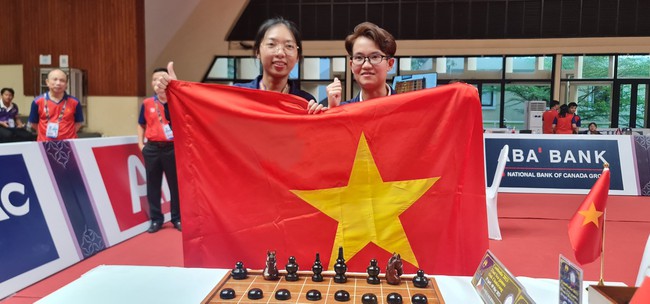 Việt Nam có HCV đầu tiên ở SEA Games 32: Tự hào cờ ốc - Ảnh 2.