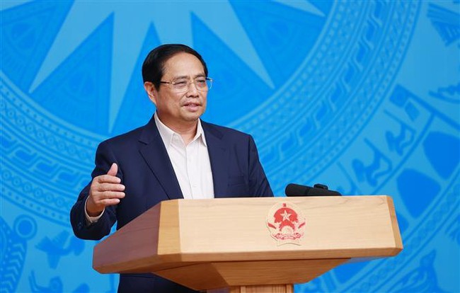 Thủ tướng Phạm Minh Chính: Covid-19 đủ điều kiện đáp ứng các tiêu chí của bệnh truyền nhiễm nhóm B - Ảnh 2.