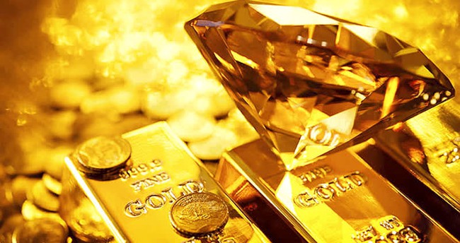 Giá vàng thế giới rơi xuống mức thấp nhất hơn một tháng - Ảnh 1.