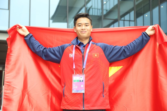 Xạ thủ Phạm Quang Huy: Ước mơ được góp mặt tại Olympic 2024 - Ảnh 1.