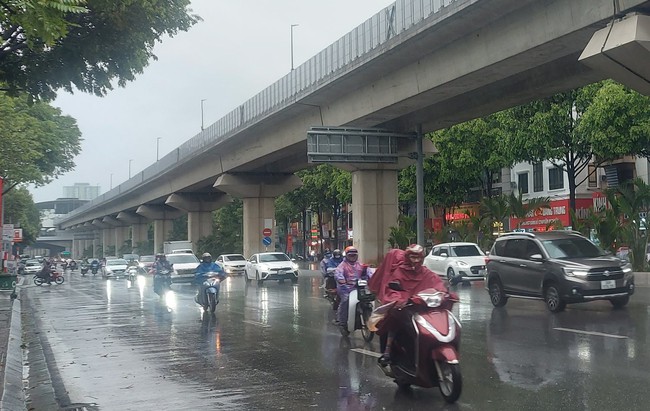 Khu vực Hà Nội, ngày có mưa vài nơi - Ảnh 1.