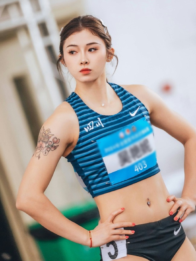 Nhan sắc của mỹ nhân điền kinh Trung Quốc, người vô đối ở nội dung 100m rào, gây chú ý vì trang điểm đậm khi thi đấu - Ảnh 5.