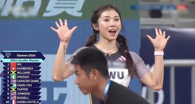 Nhan sắc của mỹ nhân điền kinh Trung Quốc, người vô đối ở nội dung 100m rào, gây chú ý vì trang điểm đậm khi thi đấu - Ảnh 3.