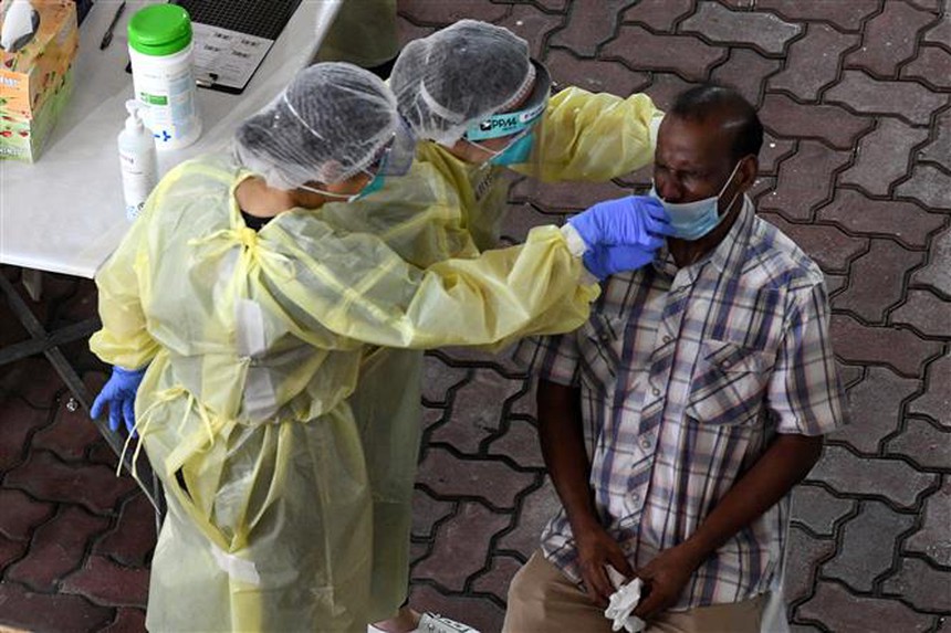 Singapore đối mặt với làn sóng lây nhiễm mới Covid-19 - Ảnh 1.