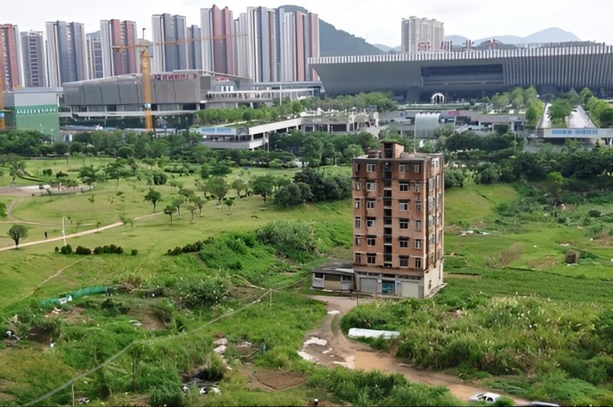 Tòa nhà 7 tầng 1000m2 nằm trên “vùng đất vàng” không chịu di dời khiến dự án bị lùi đến 7 năm: Từ chối 20 triệu NDT tiền đền bù, chỉ rời đi khi nhận được khoản tiền gấp 6 lần  - Ảnh 1.