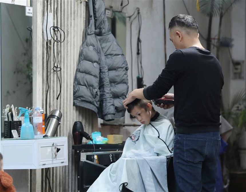 Hà Nội bình dị chiều 30 Tết - Ảnh 6.