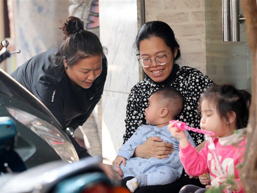 Hà Nội bình dị chiều 30 Tết - Ảnh 12.