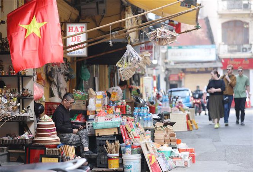 Hà Nội bình dị chiều 30 Tết - Ảnh 13.