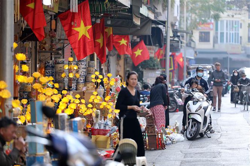 Hà Nội bình dị chiều 30 Tết - Ảnh 15.